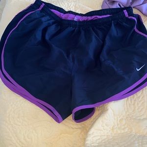 Nike Dri-Fit purple and black athletic shorts